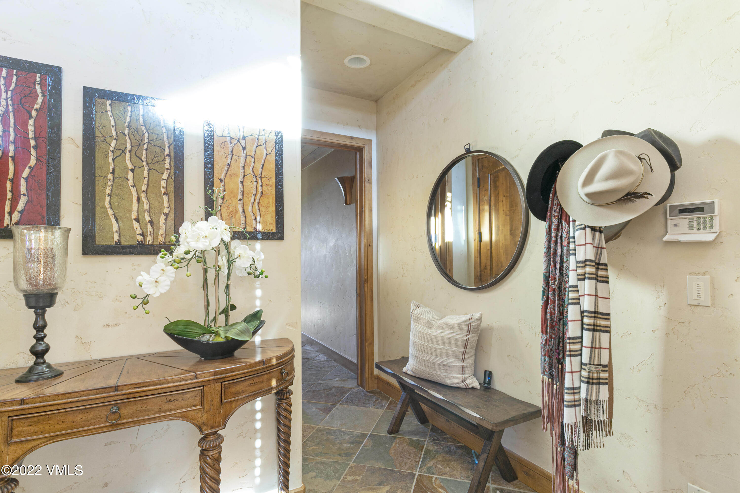 875 Cordillera Way Edwards, CO 81632 - Photo 35 of 57 a bathroom with a sink and a mirror
