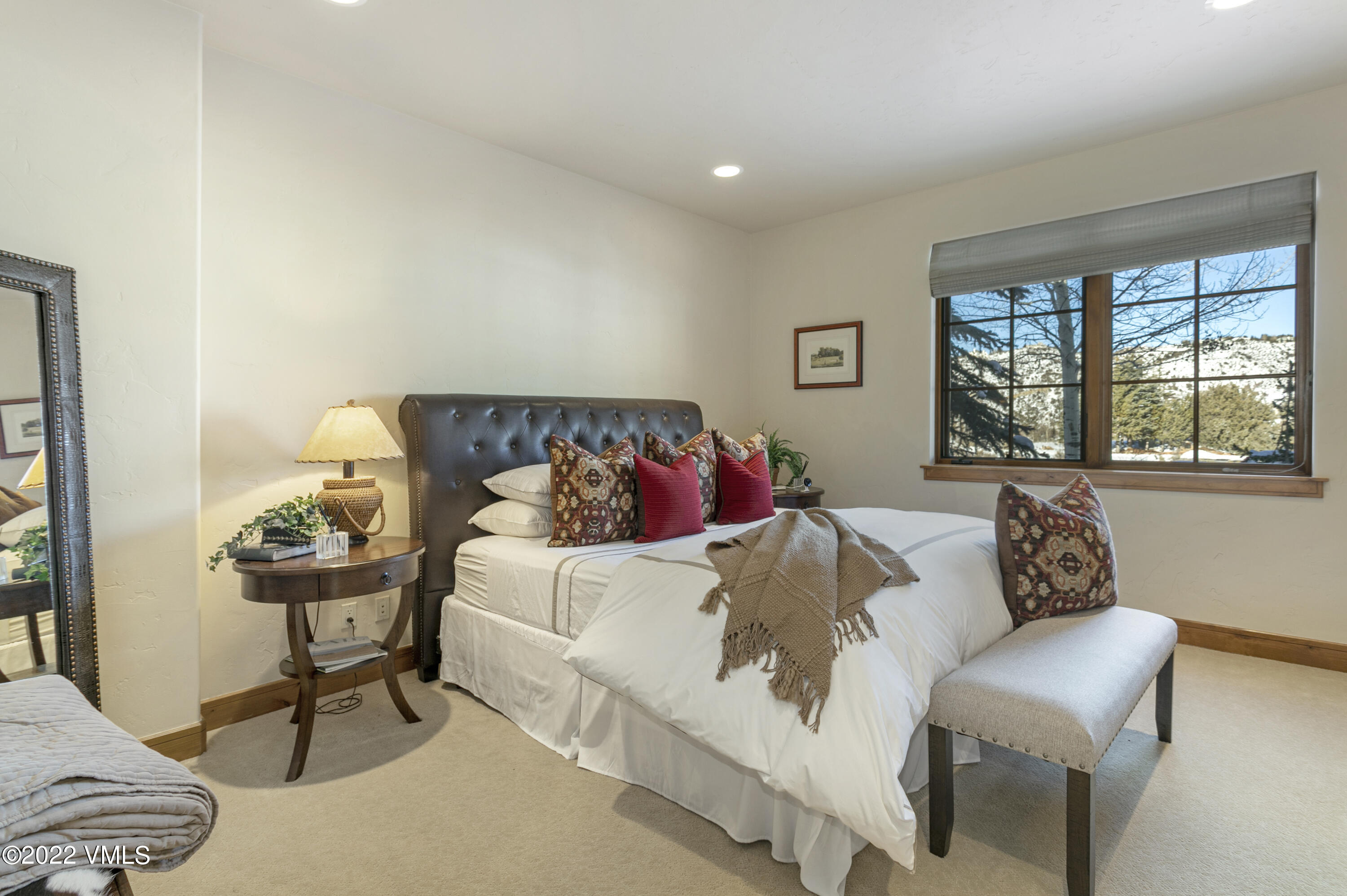 875 Cordillera Way Edwards, CO 81632 - Photo 40 of 57 a bedroom with a bed and window