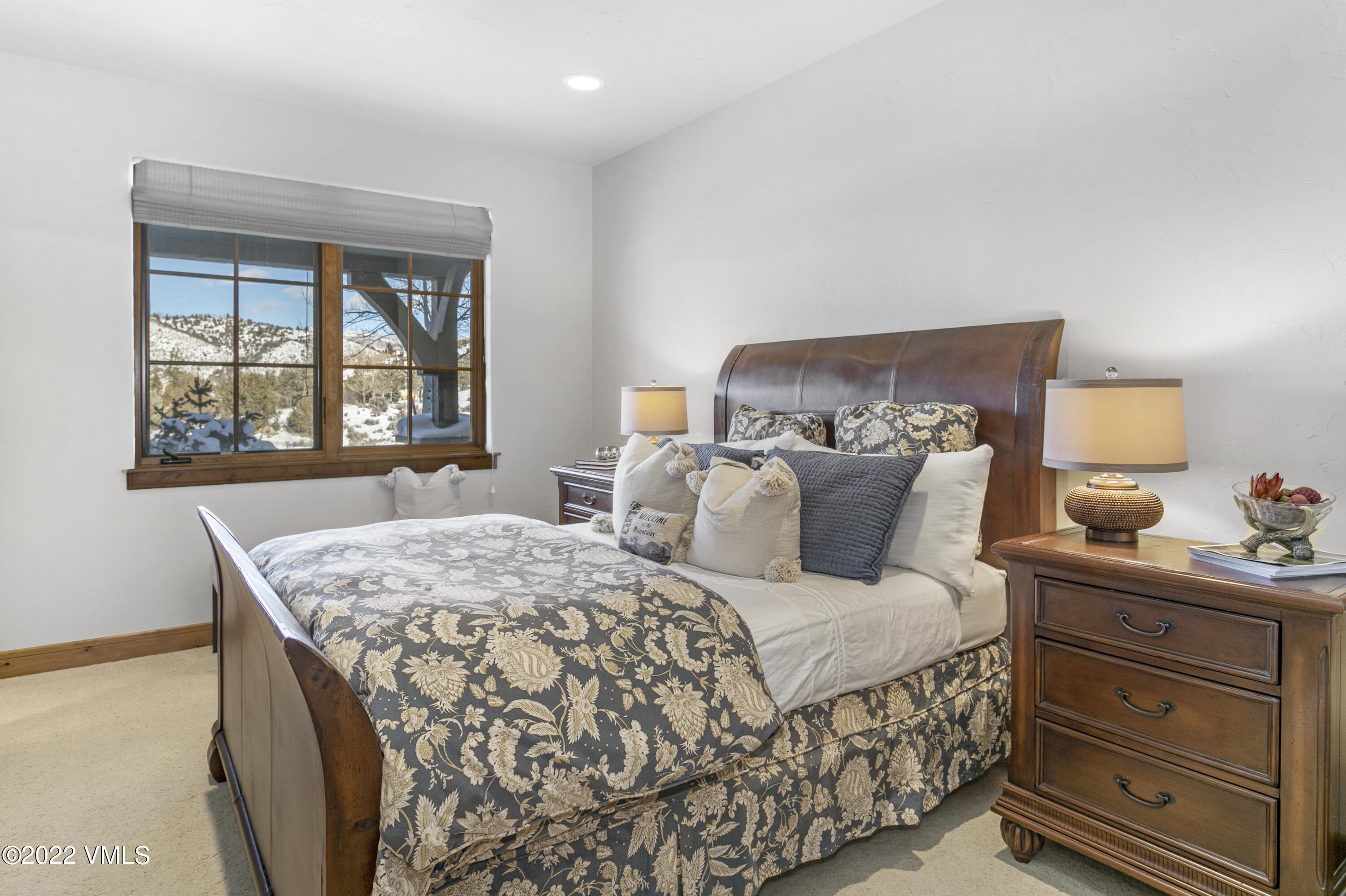 875 Cordillera Way Edwards, CO 81632 - Photo 42 of 57 a bedroom with a bed and window