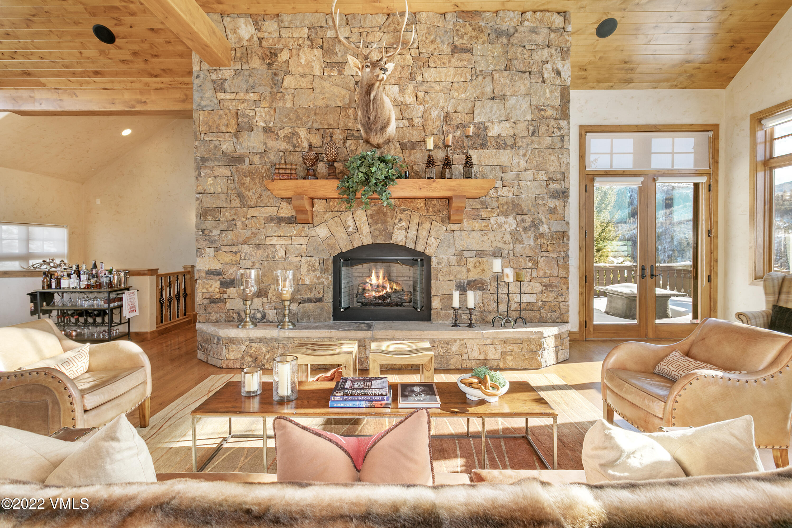 875 Cordillera Way Edwards, CO 81632 - Photo 8 of 57 a living room with furniture and a fireplace
