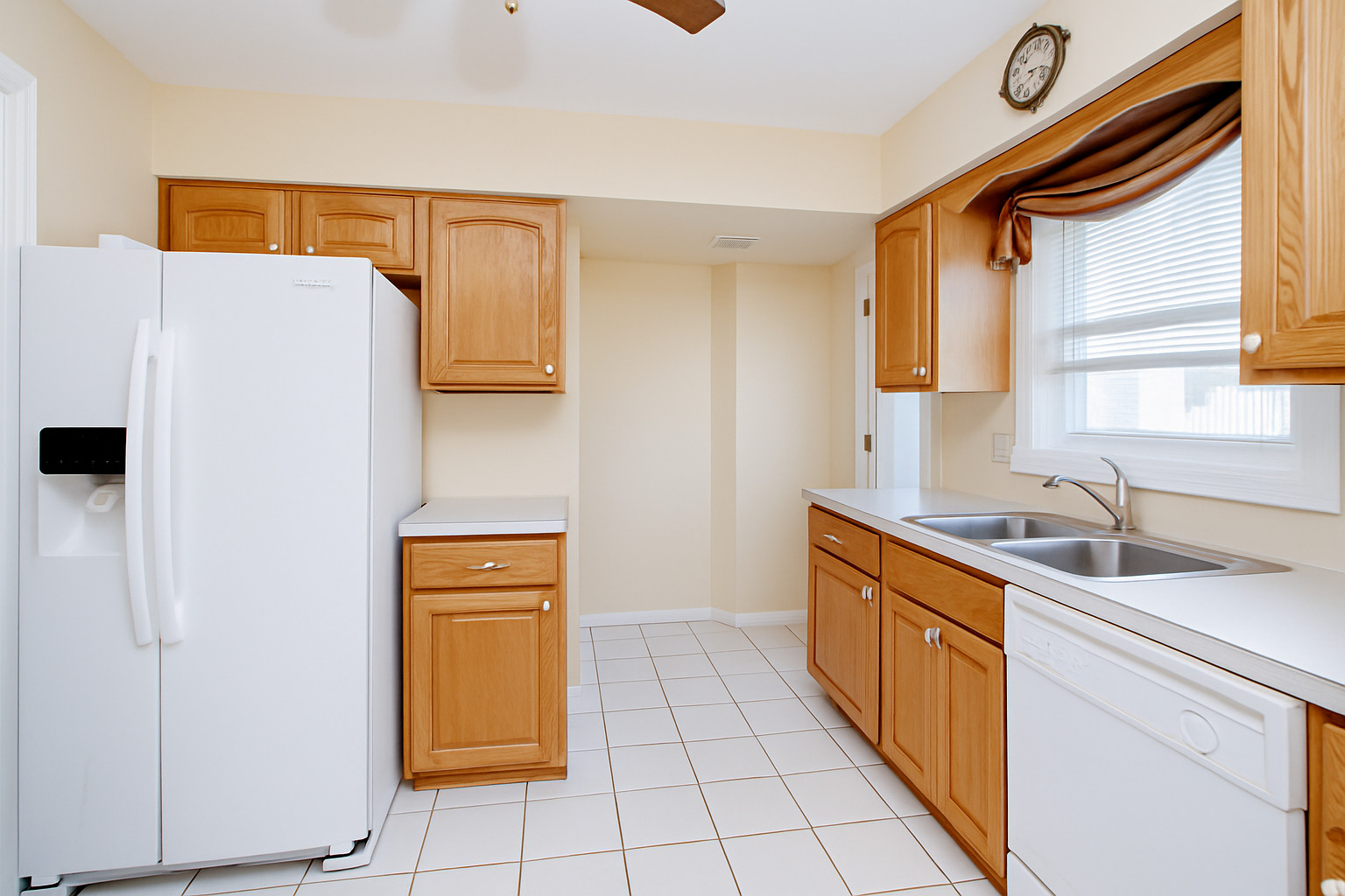 311 Vine Avenue, Unit E Park Ridge, IL 60068 - Photo 9 of 21 a kitchen with stainless steel appliances granite countertop a sink and a refrigerator