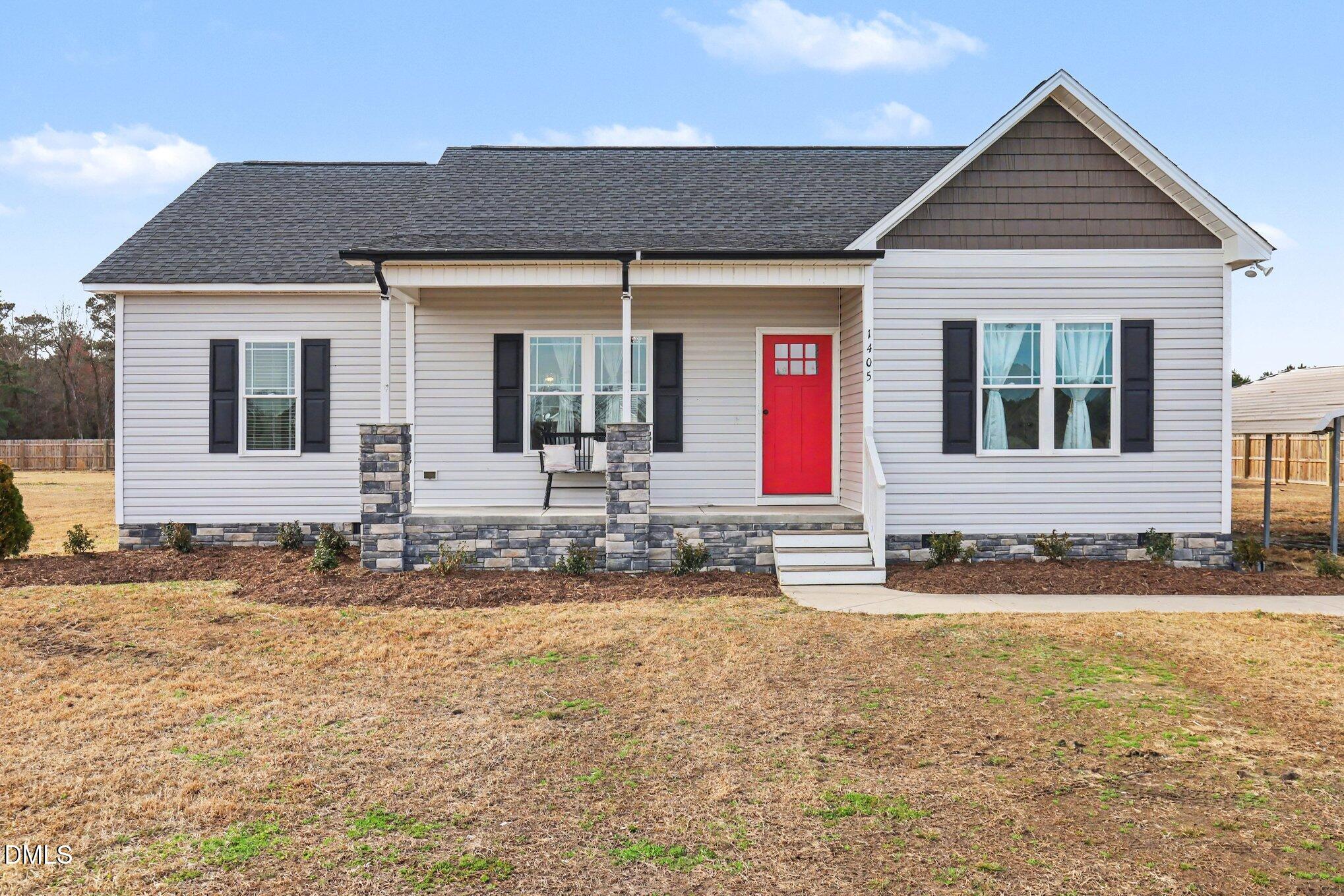 1405 New Daniels Chapel Road Fremont, NC 27830 - Photo 3 of 20 front view of a house with a yard