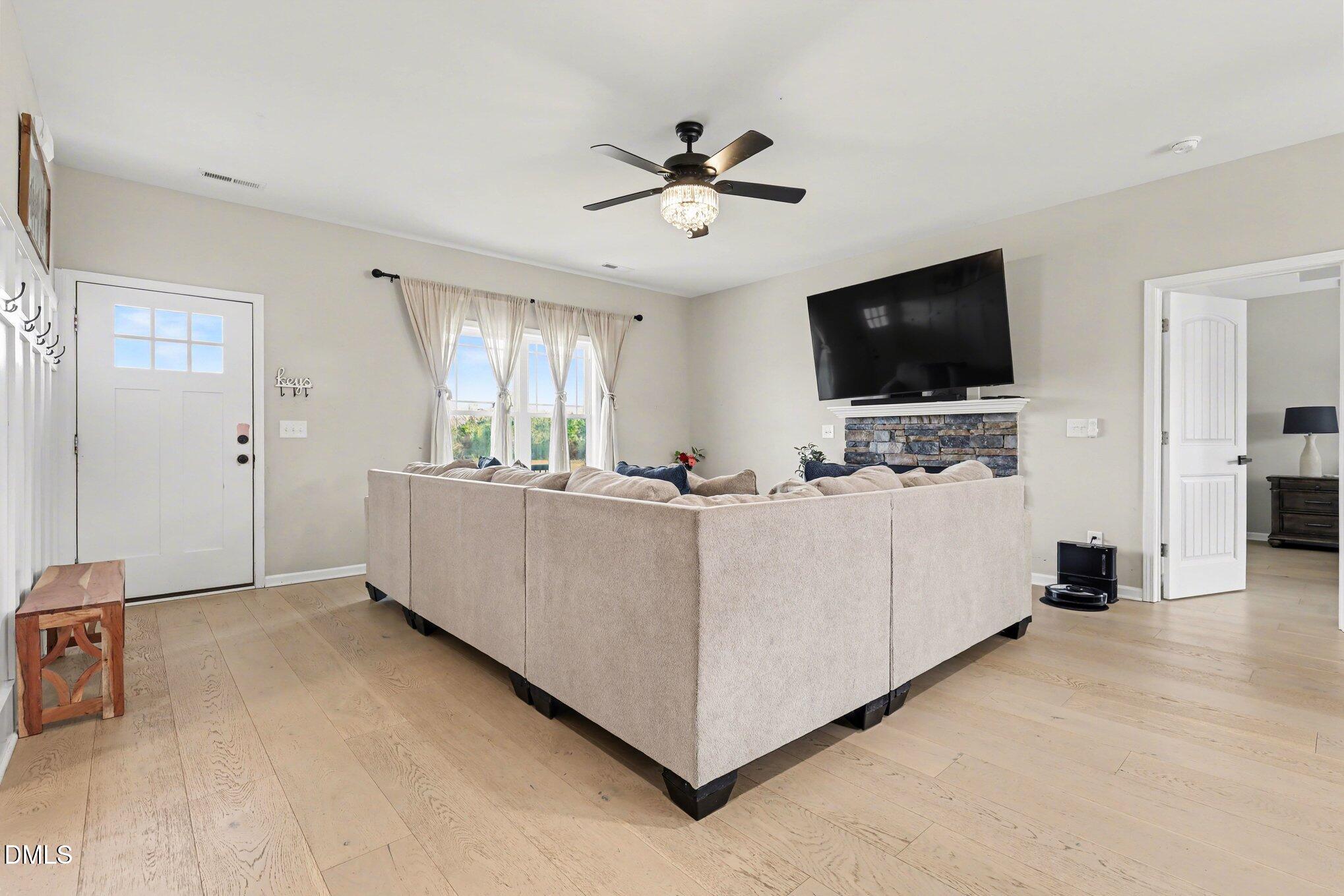 1405 New Daniels Chapel Road Fremont, NC 27830 - Photo 4 of 20 a living room with furniture and a flat screen tv