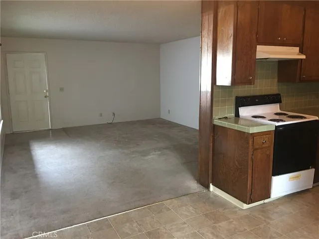 a view of a kitchen with a sink