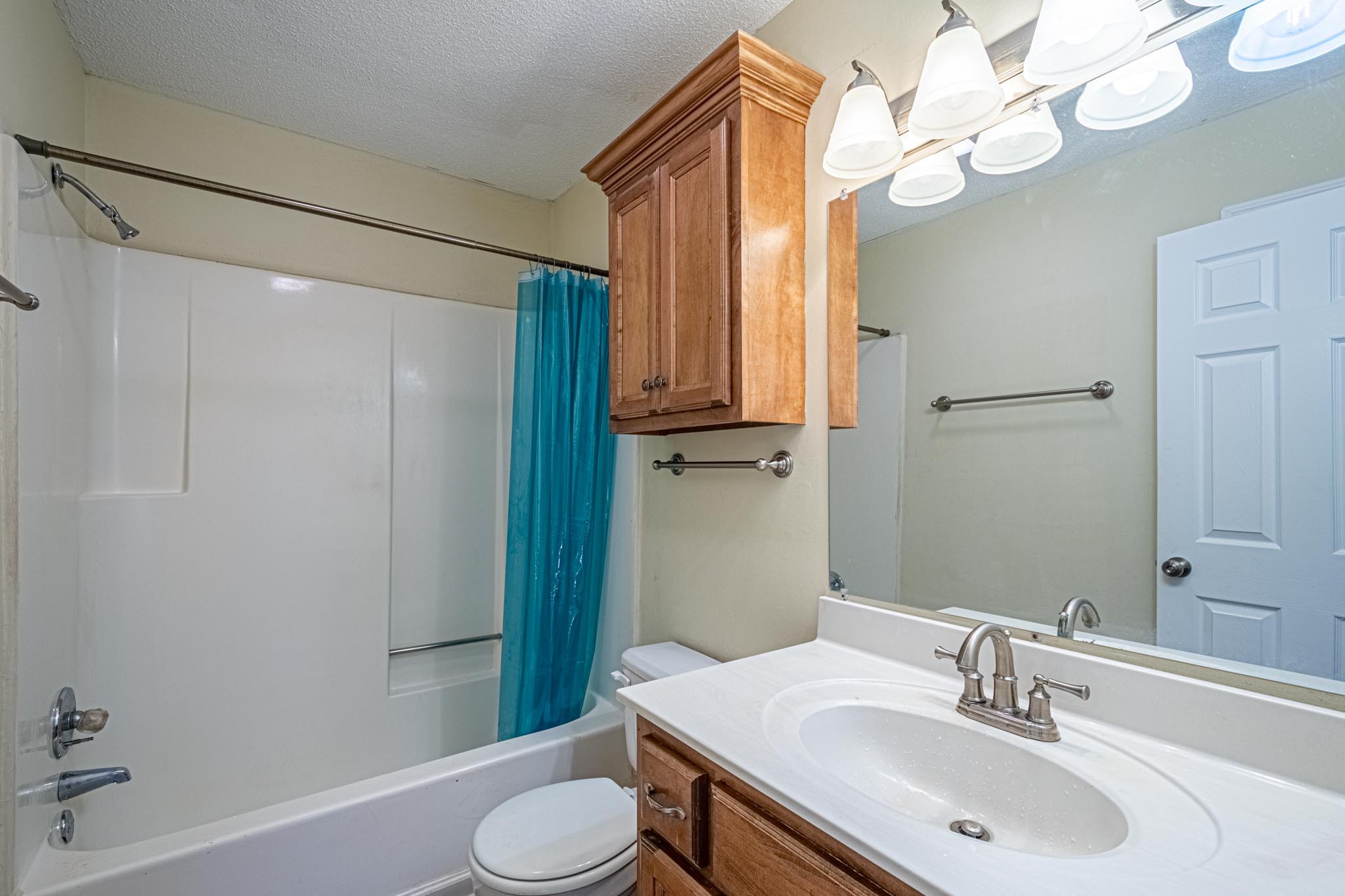 2294 Oak Grove Road Goodspring, TN 38460 - Photo 17 of 40 a bathroom with a sink a toilet and shower