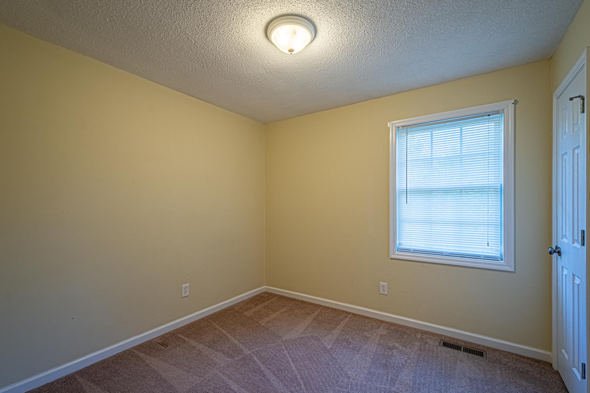 2294 Oak Grove Road Goodspring, TN 38460 - Photo 18 of 40 an empty room with a window