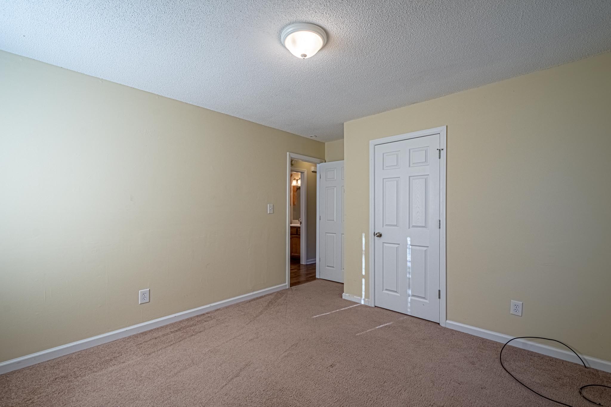 2294 Oak Grove Road Goodspring, TN 38460 - Photo 21 of 40 an empty room with glass door and shower