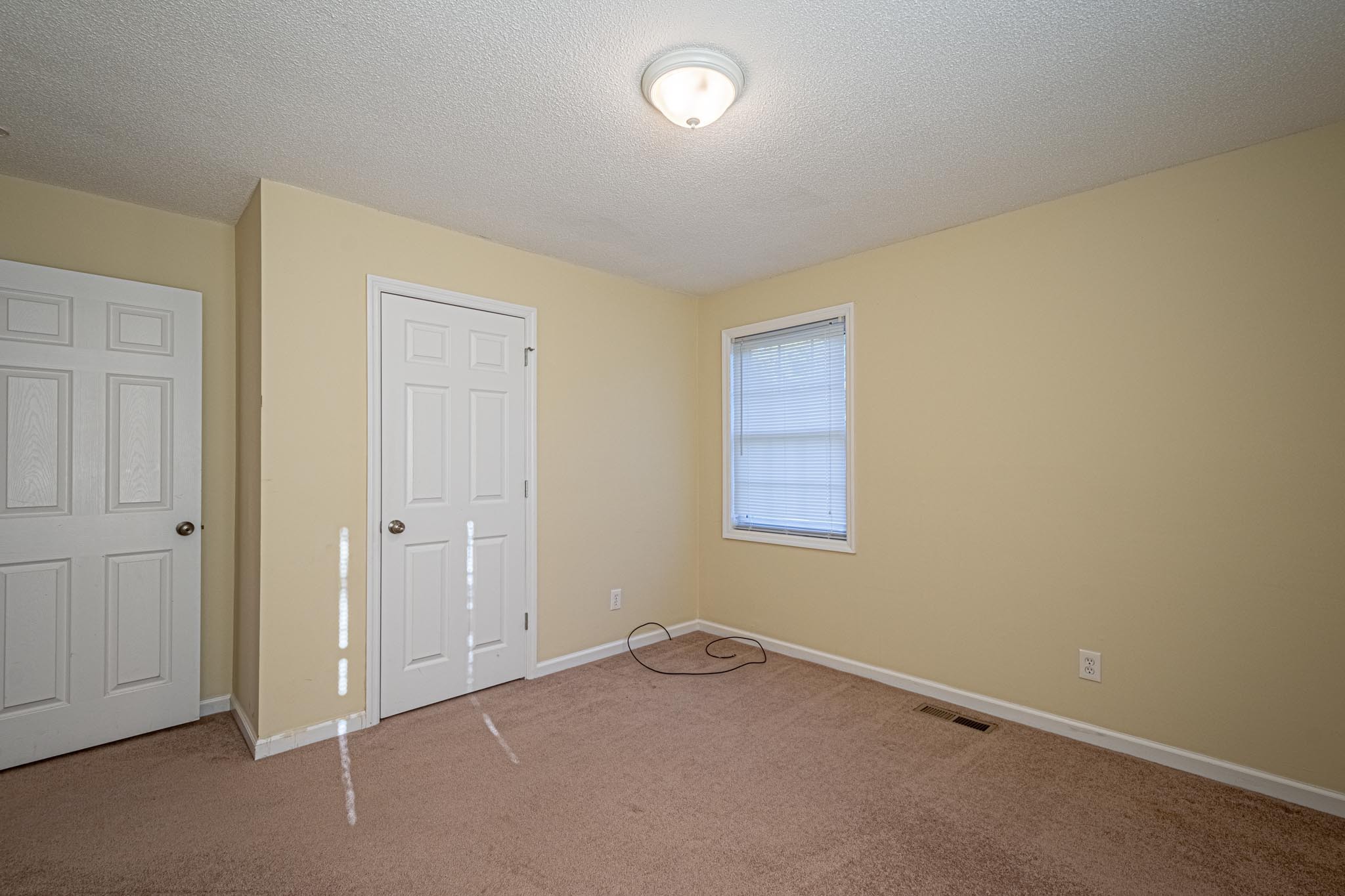 2294 Oak Grove Road Goodspring, TN 38460 - Photo 22 of 40 an empty room with a empty space and windows