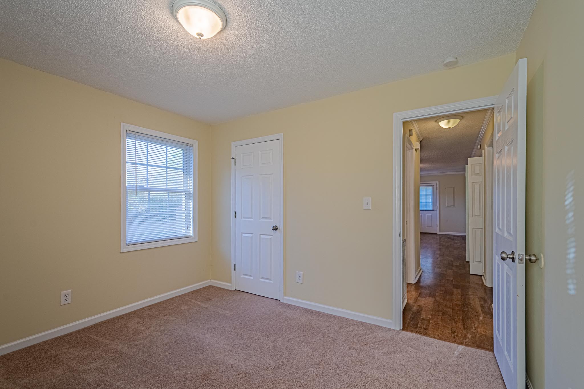 2294 Oak Grove Road Goodspring, TN 38460 - Photo 25 of 40 an empty room with windows and closet