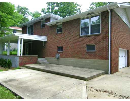 Exterior Back. Extra Concrete Pad for Parking!