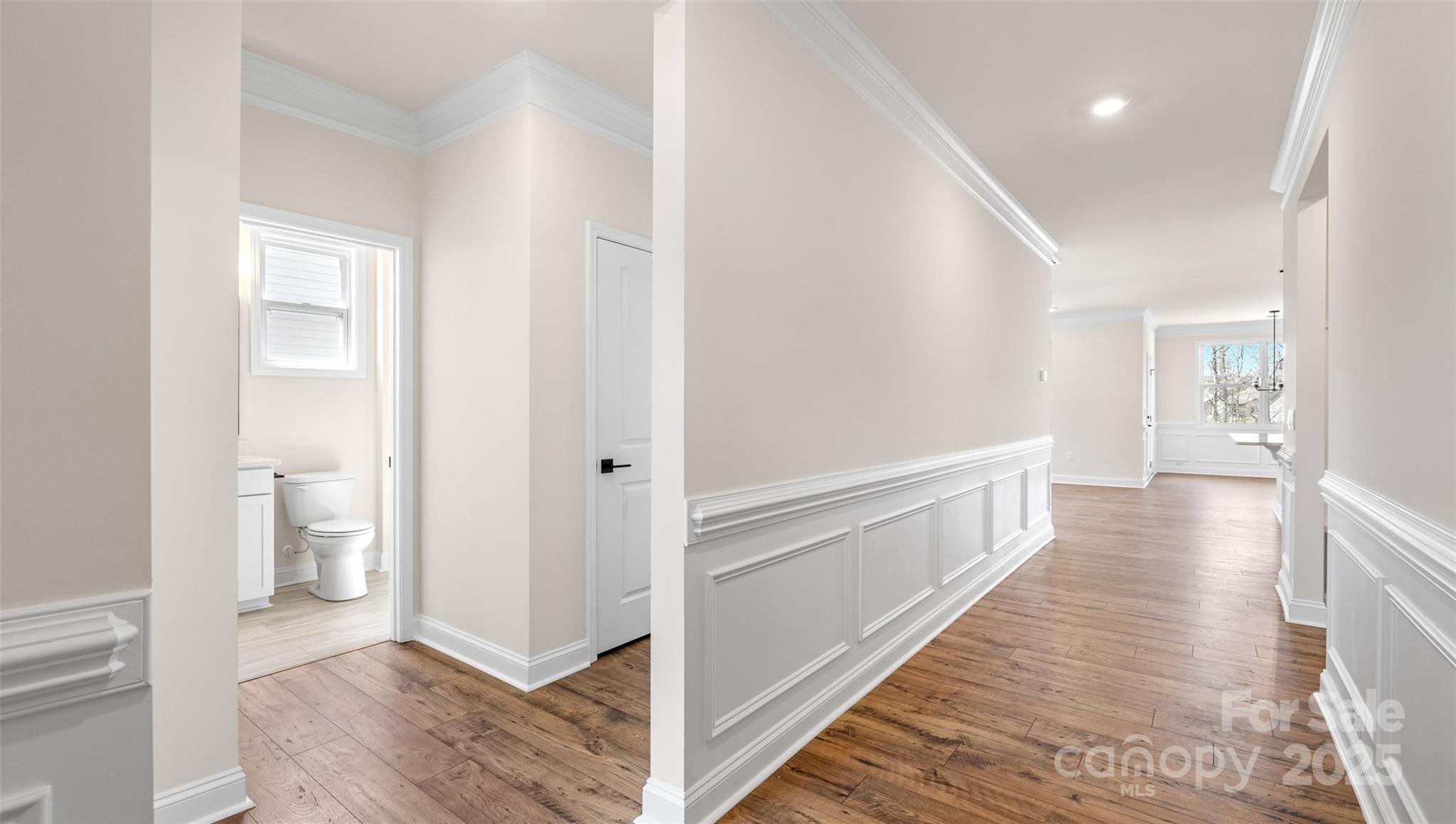 610 River Btm Road Fletcher, NC 28732 - Photo 17 of 28 a view of a hallway with wooden floor and a bathroom