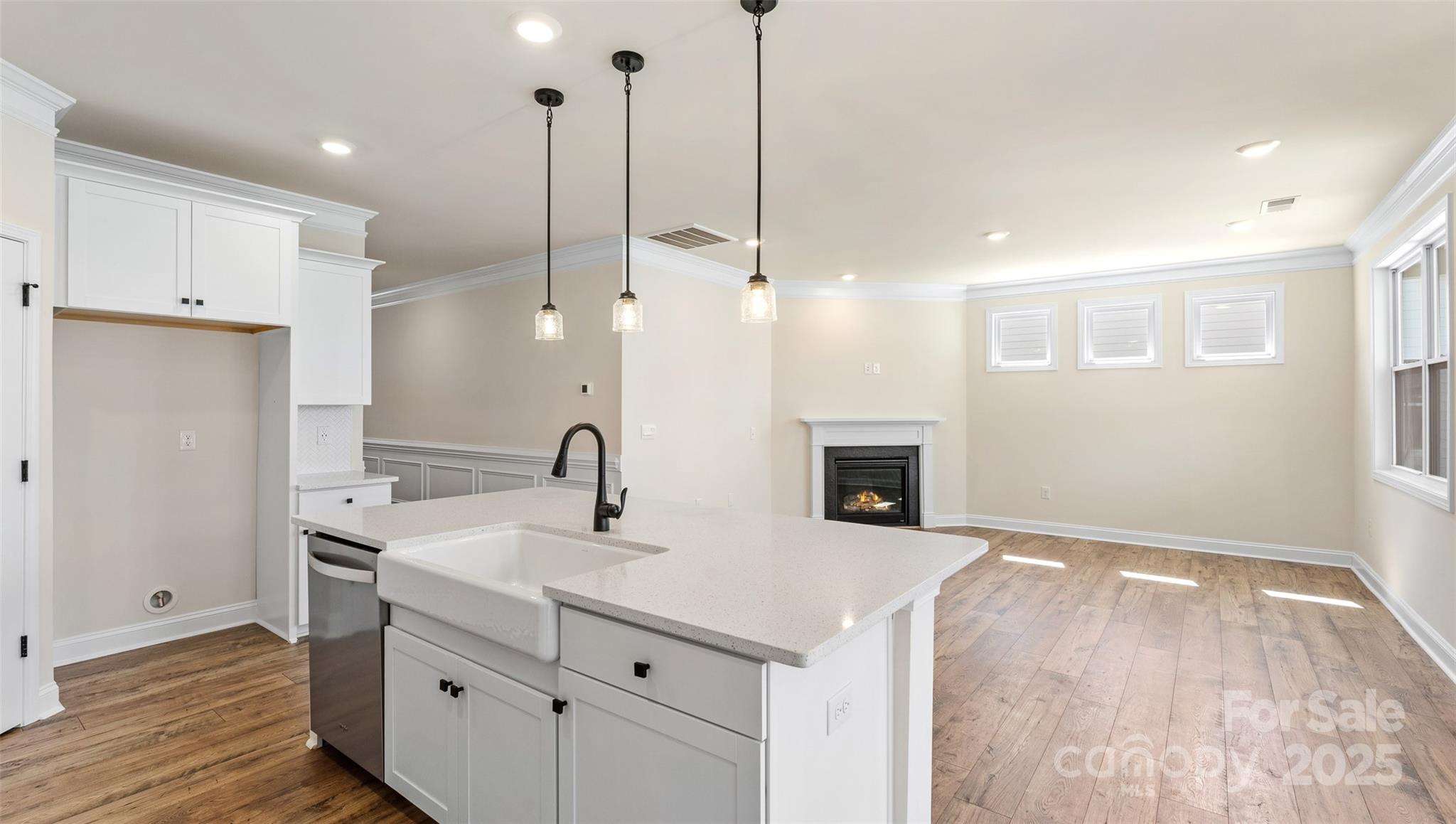 610 River Btm Road Fletcher, NC 28732 - Photo 6 of 28 a kitchen with sink cabinets and wooden floor