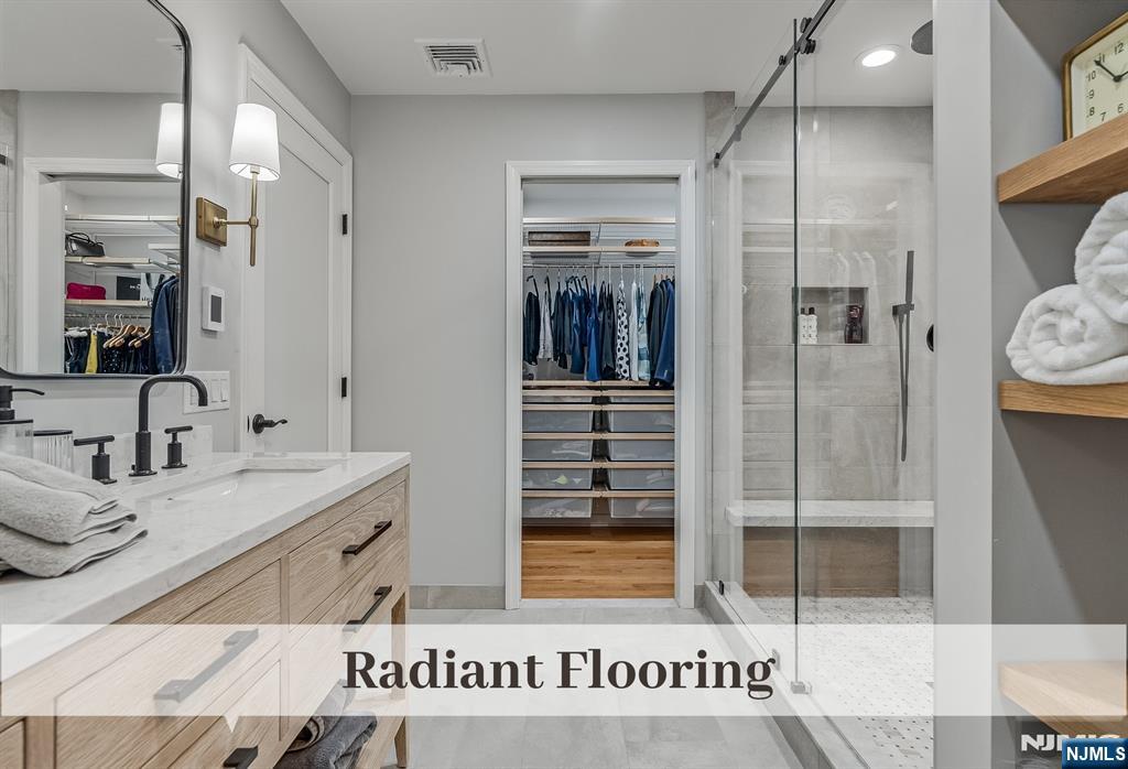 446 Upper Boulevard Ridgewood, NJ 07450 - Photo 24 of 48 a bathroom with a sink and a mirror