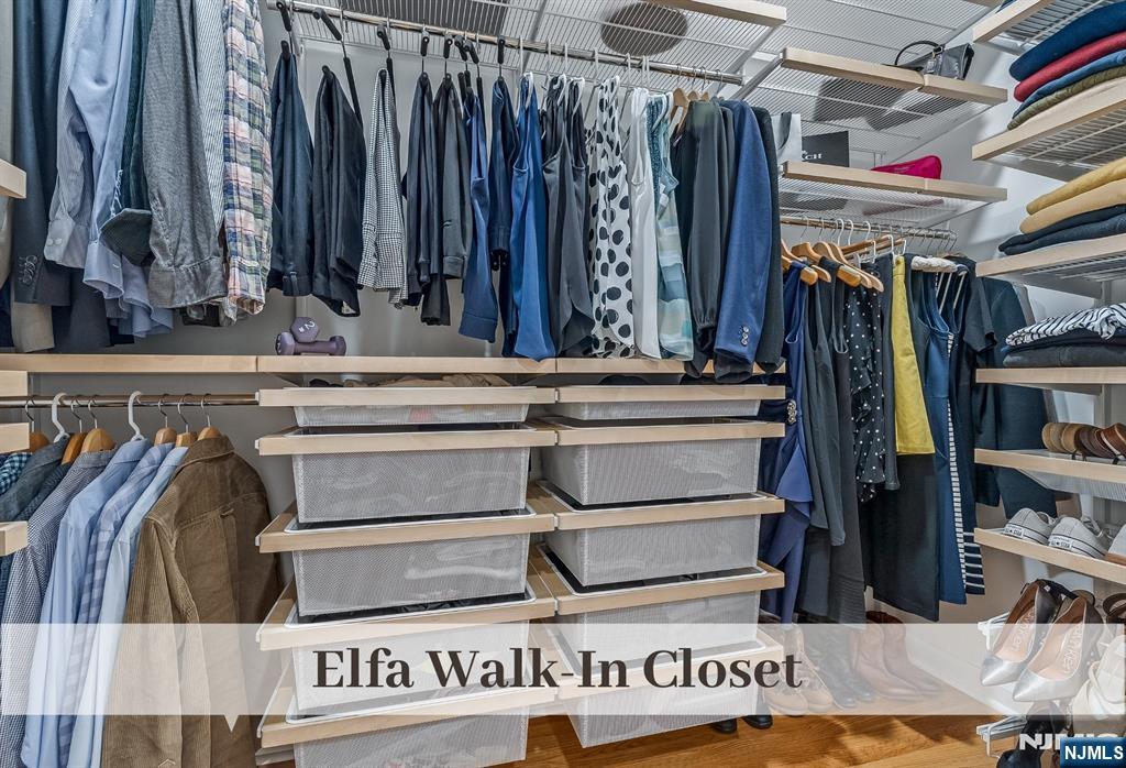 446 Upper Boulevard Ridgewood, NJ 07450 - Photo 25 of 48 a view of walk in closet with clothes and shoes