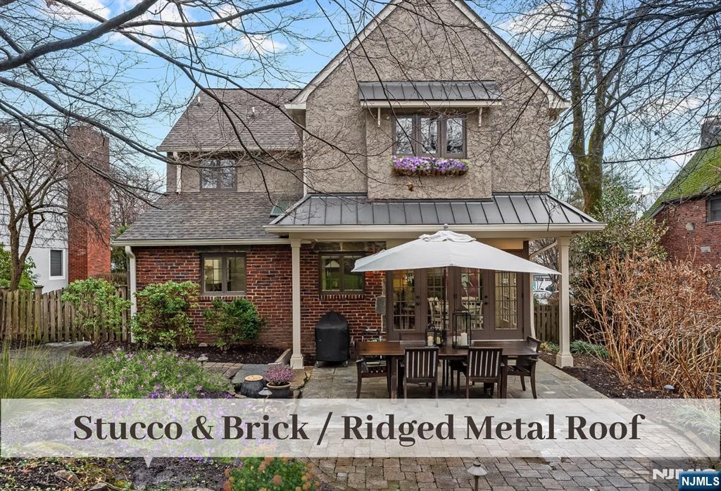 446 Upper Boulevard Ridgewood, NJ 07450 - Photo 38 of 48 a front view of house with an outdoor space