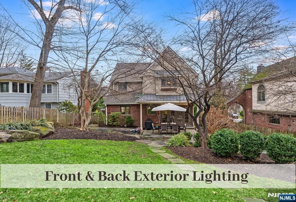 446 Upper Boulevard Ridgewood, NJ 07450 - Photo 40 of 48 a front view of a building with garden