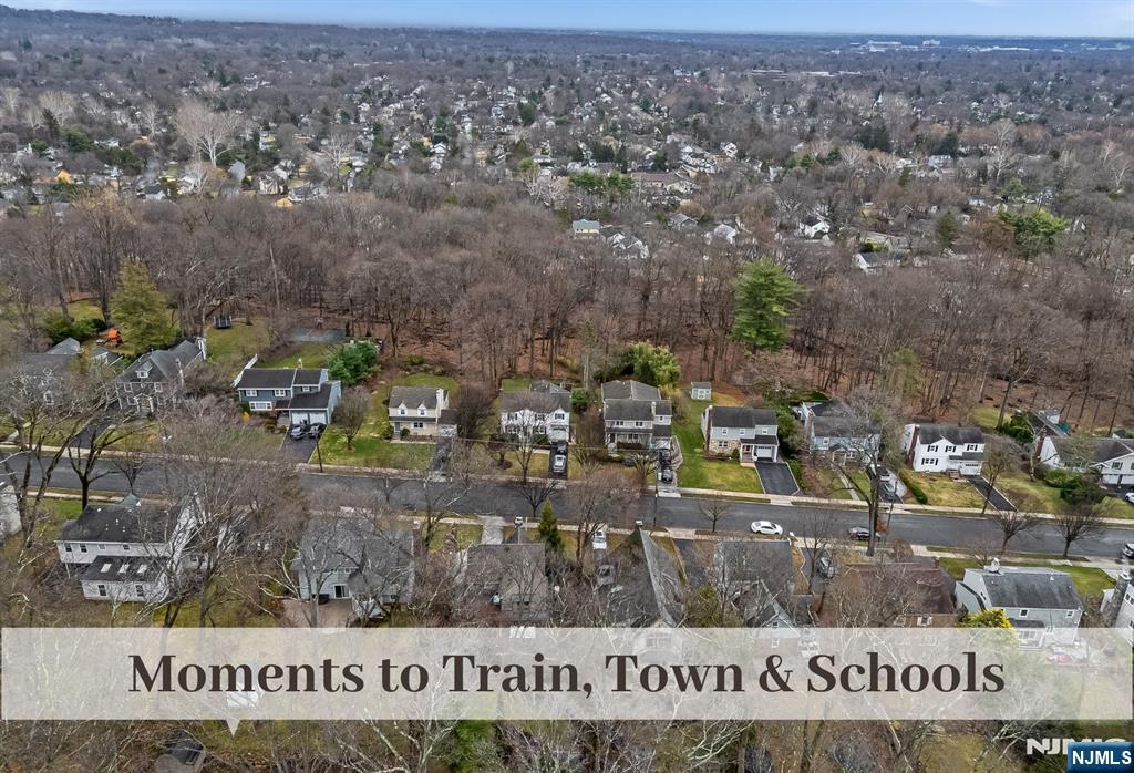 446 Upper Boulevard Ridgewood, NJ 07450 - Photo 43 of 48 an aerial view of residential houses with outdoor space