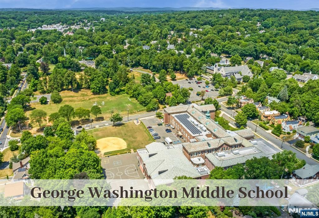 446 Upper Boulevard Ridgewood, NJ 07450 - Photo 46 of 48 an aerial view of a residential houses with outdoor space and garden view