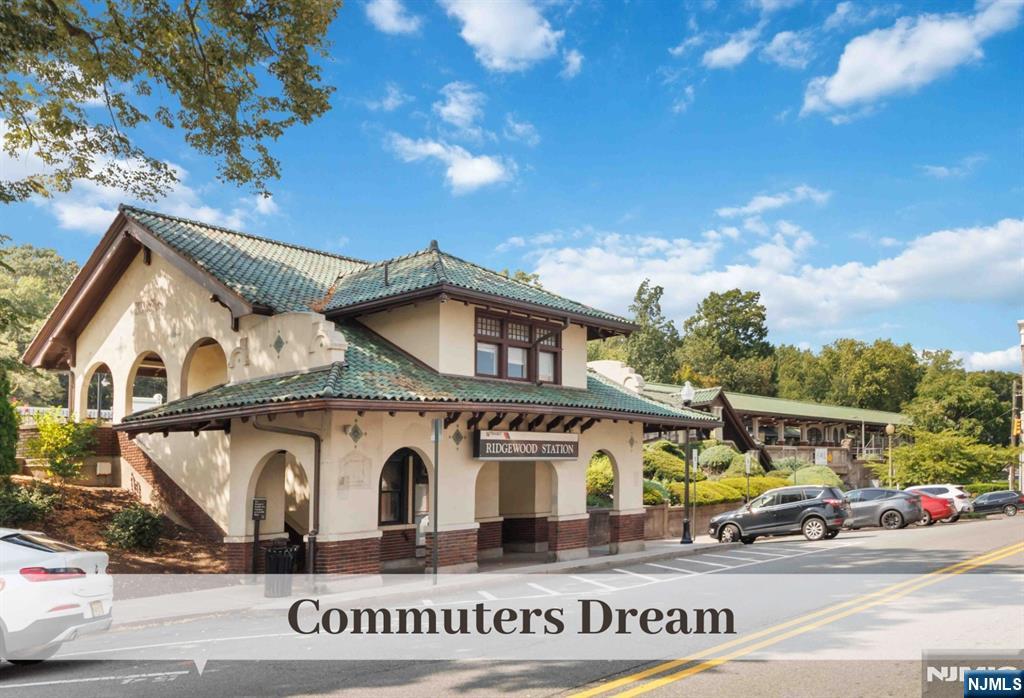446 Upper Boulevard Ridgewood, NJ 07450 - Photo 48 of 48 a view of a white house with a large tree