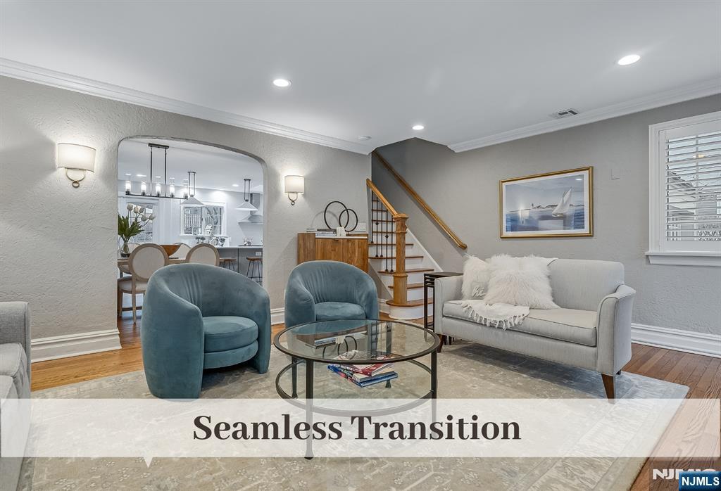 446 Upper Boulevard Ridgewood, NJ 07450 - Photo 7 of 48 a living room with furniture a rug and a window