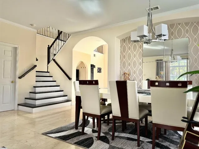 a view of a livingroom with furniture and a window