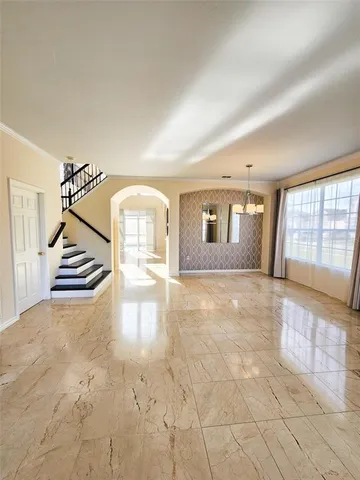 a bathroom with a double vanity sink a mirror and a bathtub