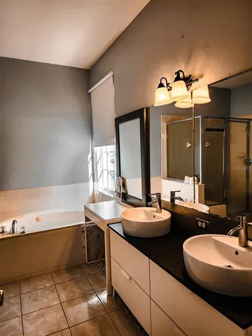 a view of an empty room with a cabinet