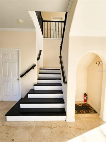 a view of closet area with empty racks