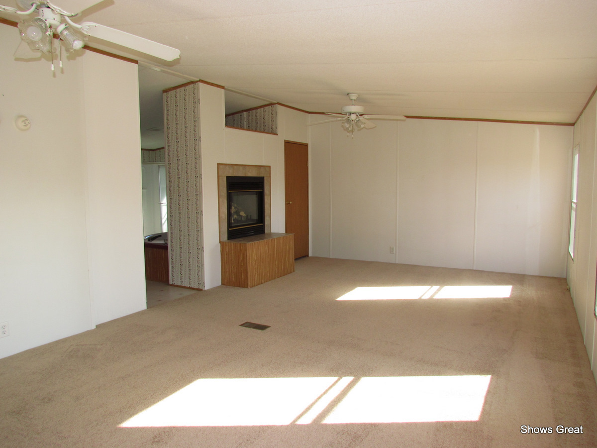 4714 Wade Road Roanoke, VA 24018 - Photo 4 of 16 a view of a big room with a fireplace