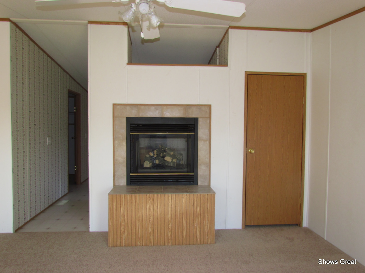 4714 Wade Road Roanoke, VA 24018 - Photo 7 of 16 a living room with a fireplace