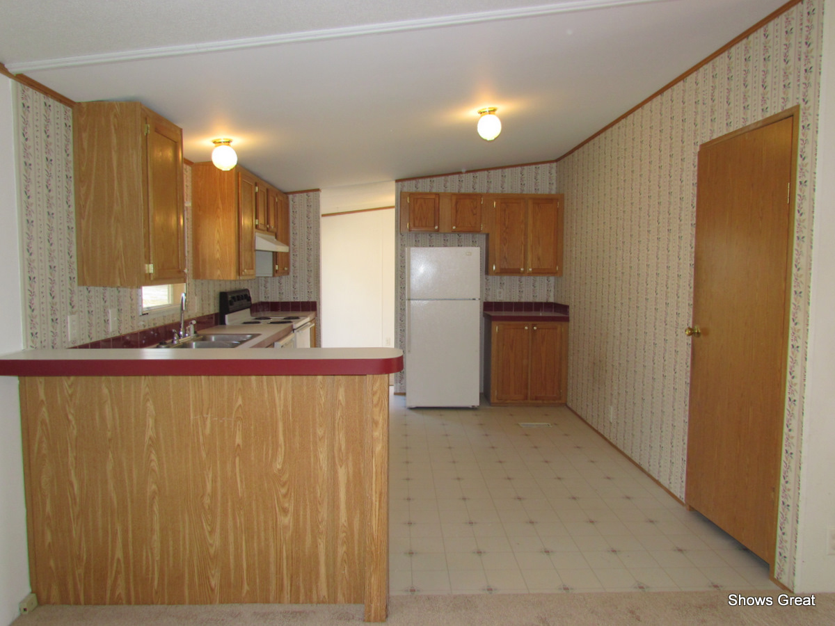 4714 Wade Road Roanoke, VA 24018 - Photo 9 of 16 a view of a kitchen with a sink