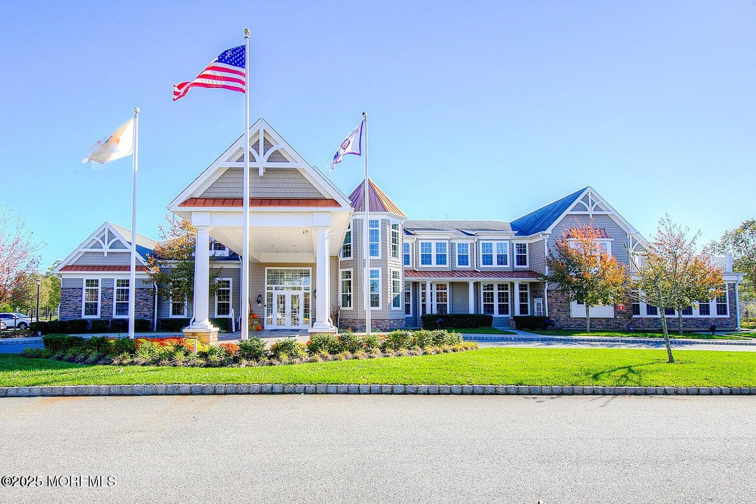 339 Newport Way Little Egg Harbor, NJ 08087 - Photo 19 of 32 a front view of a house with a yard