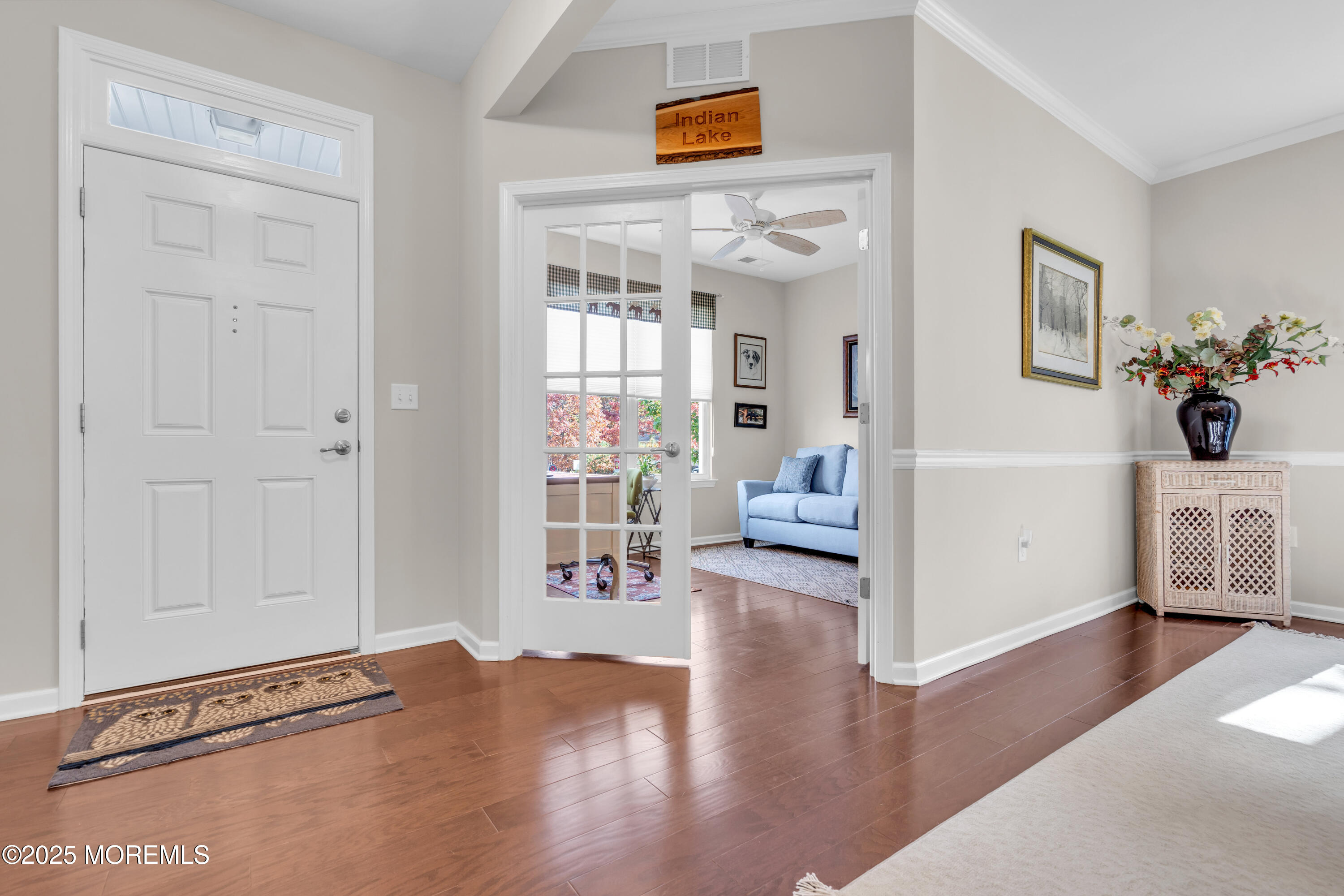 339 Newport Way Little Egg Harbor, NJ 08087 - Photo 4 of 32 a view of a livingroom with wooden floor and furniture