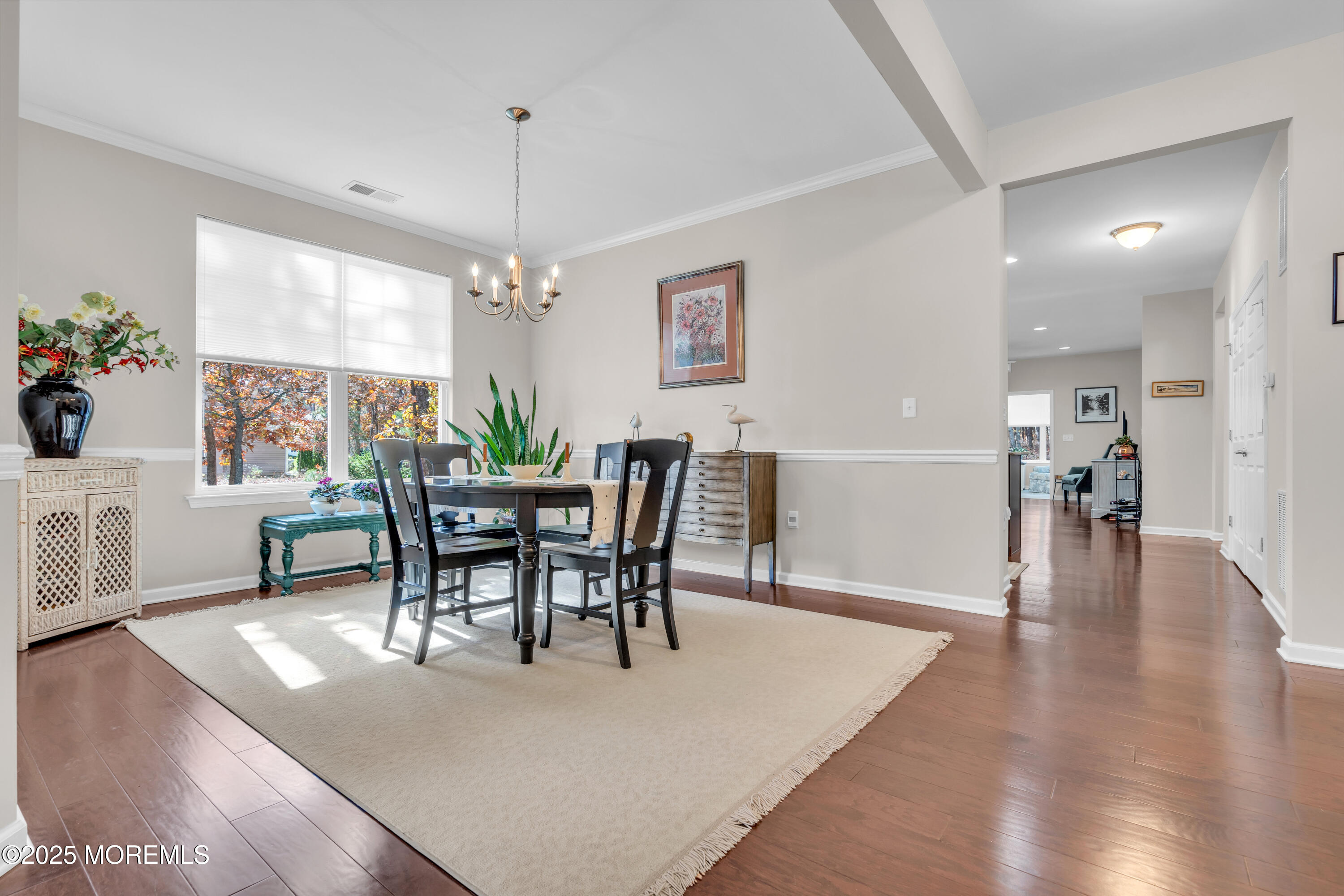 339 Newport Way Little Egg Harbor, NJ 08087 - Photo 6 of 32 a view of a dining room with furniture window and wooden floor