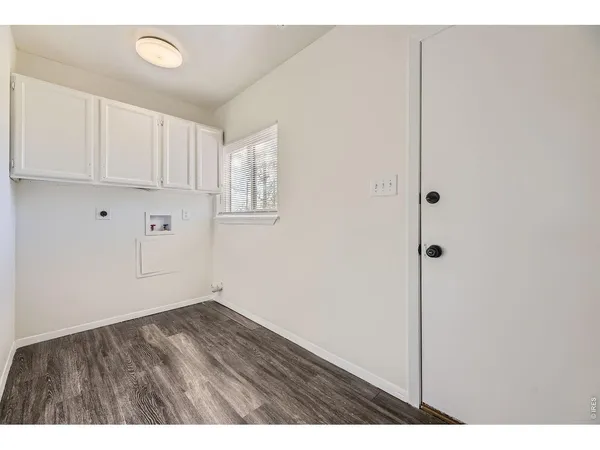 a bathroom with a toilet a sink and a bathtub