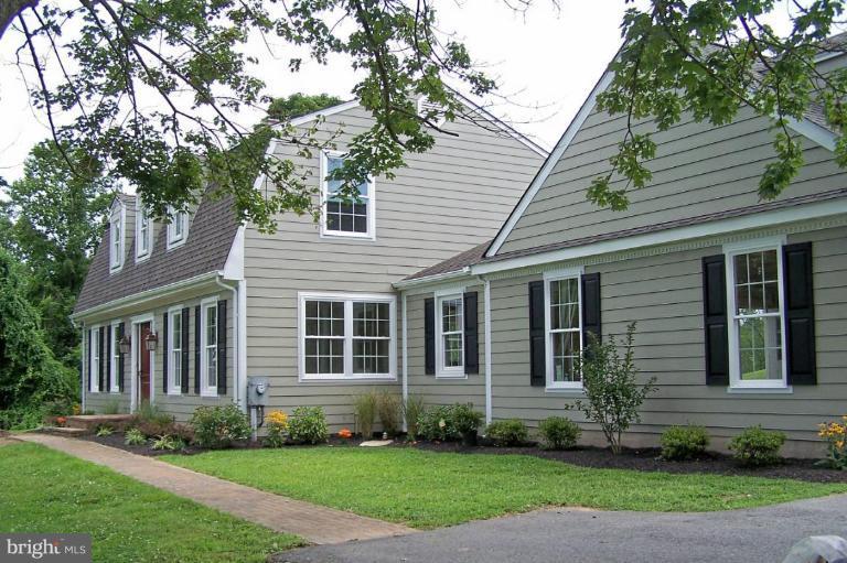 1039 Corbett Road Monkton, MD 21111 - Photo 1 of 22 a view of a house with a yard and plants
