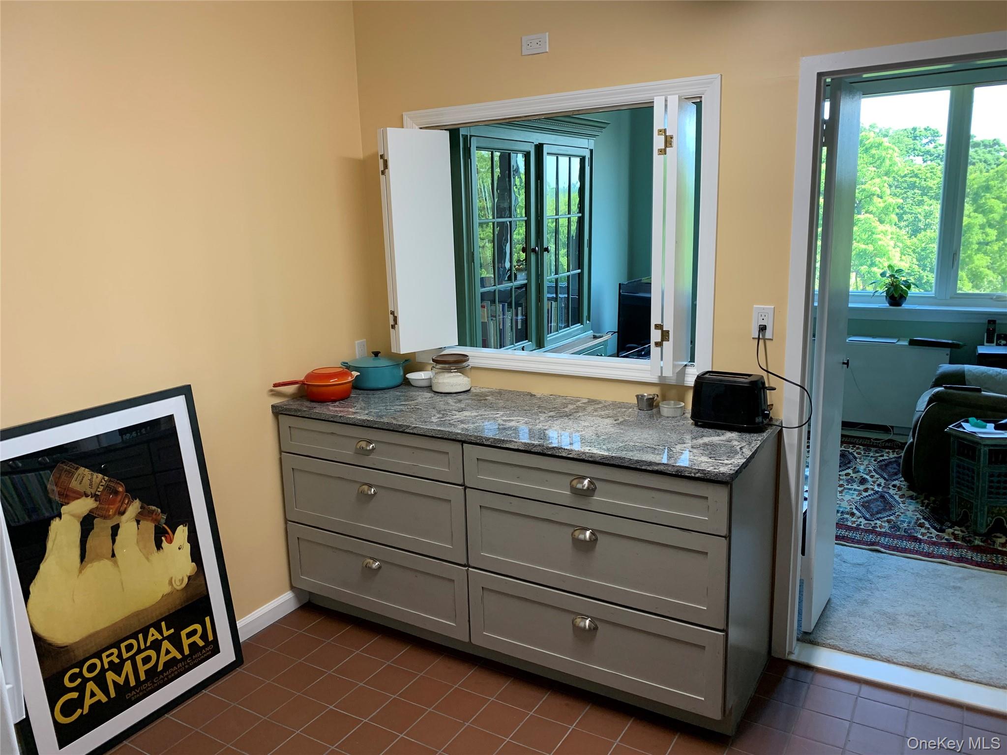 16 Rockledge Avenue, Unit 5L2 Ossining, NY 10562 - Photo 13 of 33 a living room with furniture and a window