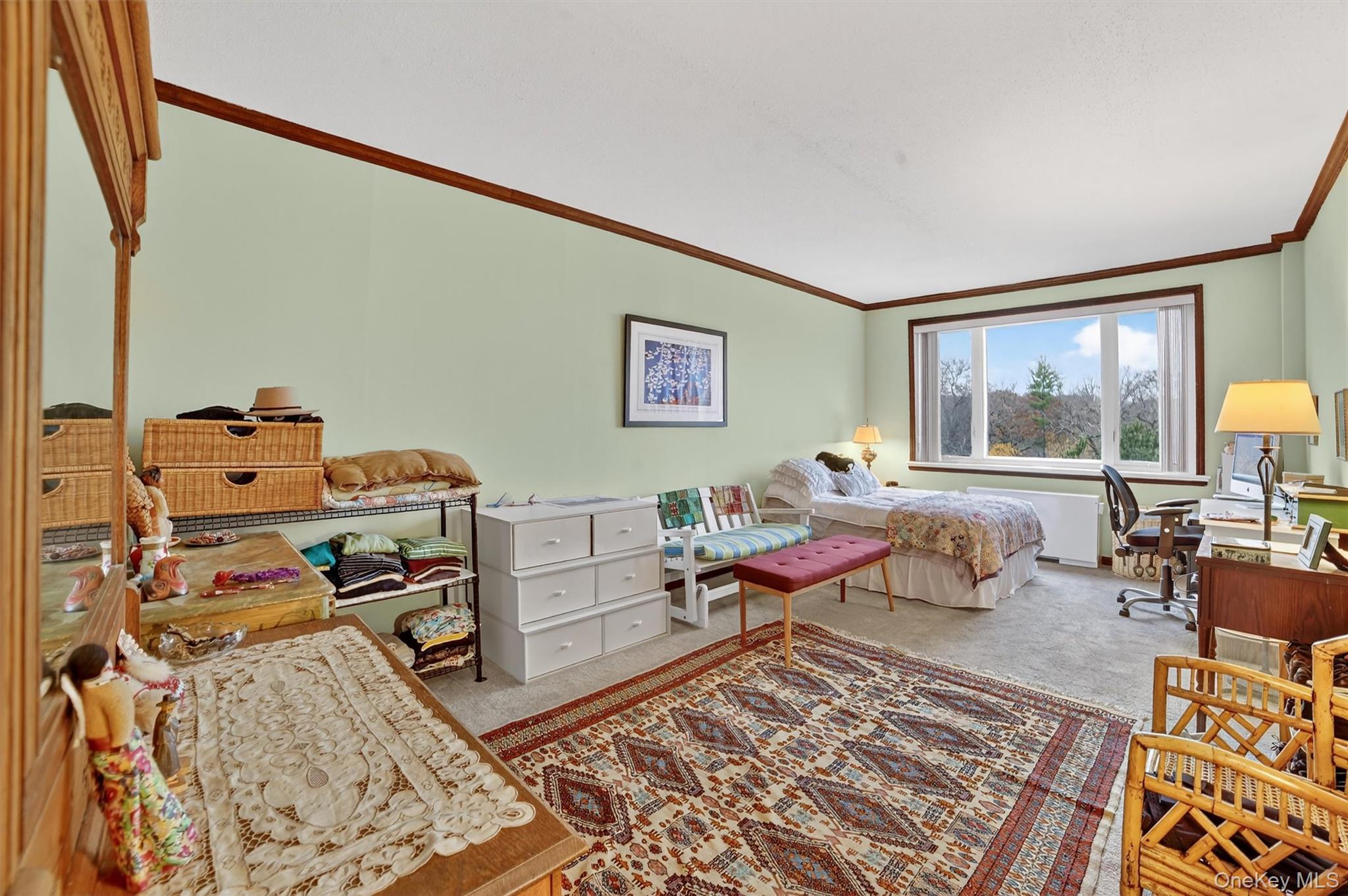16 Rockledge Avenue, Unit 5L2 Ossining, NY 10562 - Photo 17 of 33 a living room with furniture and a table