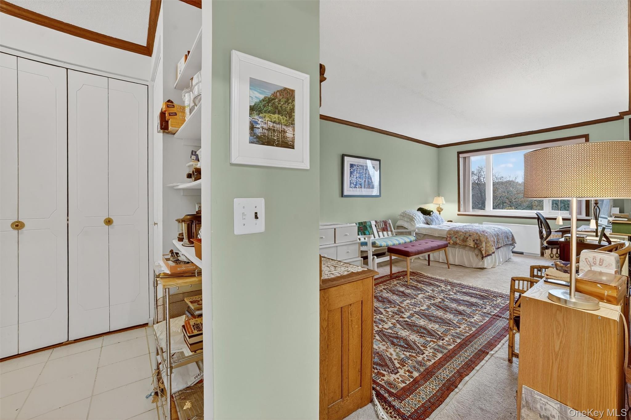 16 Rockledge Avenue, Unit 5L2 Ossining, NY 10562 - Photo 19 of 33 a living room with furniture and a window