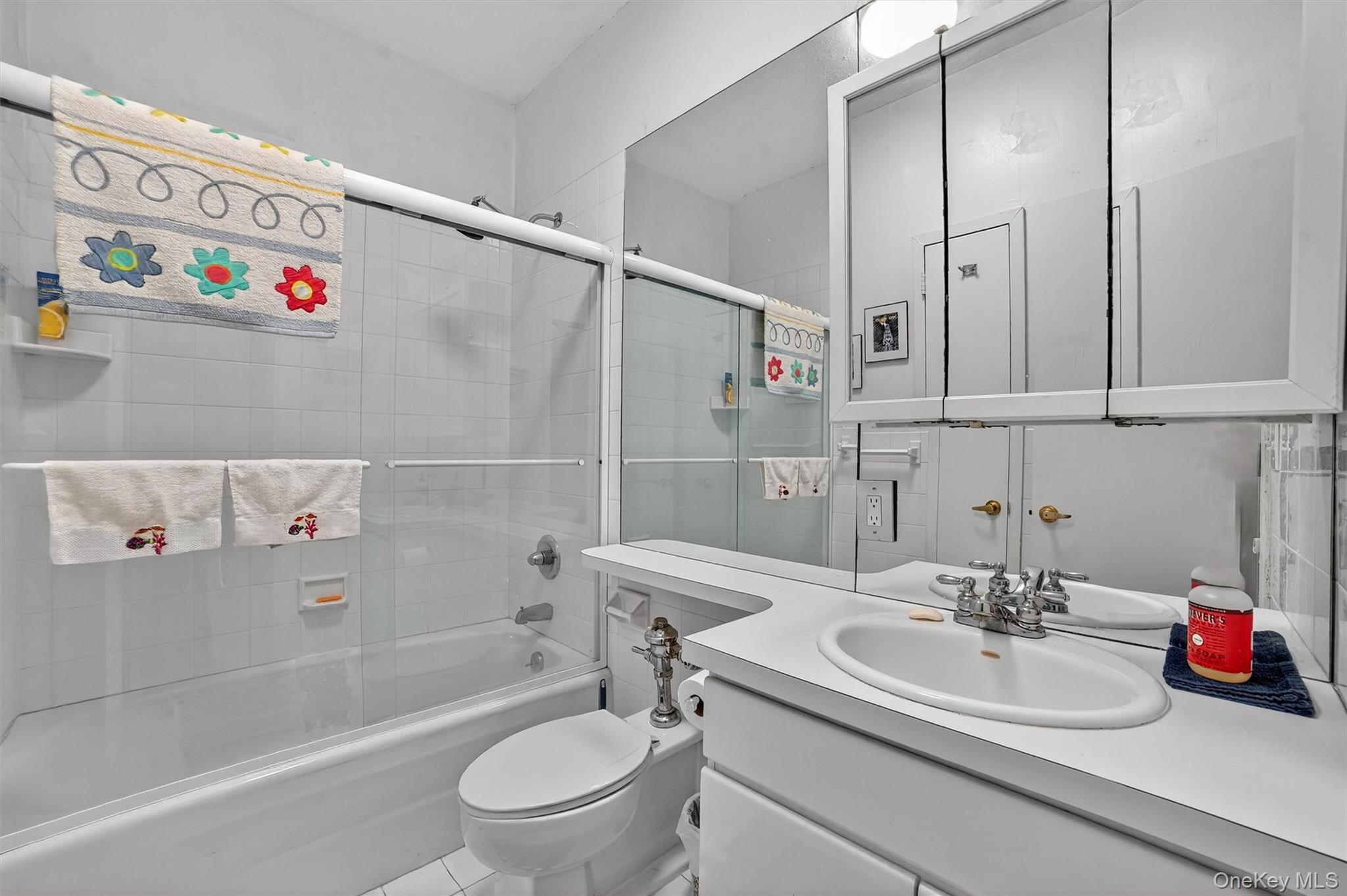 16 Rockledge Avenue, Unit 5L2 Ossining, NY 10562 - Photo 22 of 33 a bathroom with a sink a toilet and a bathtub