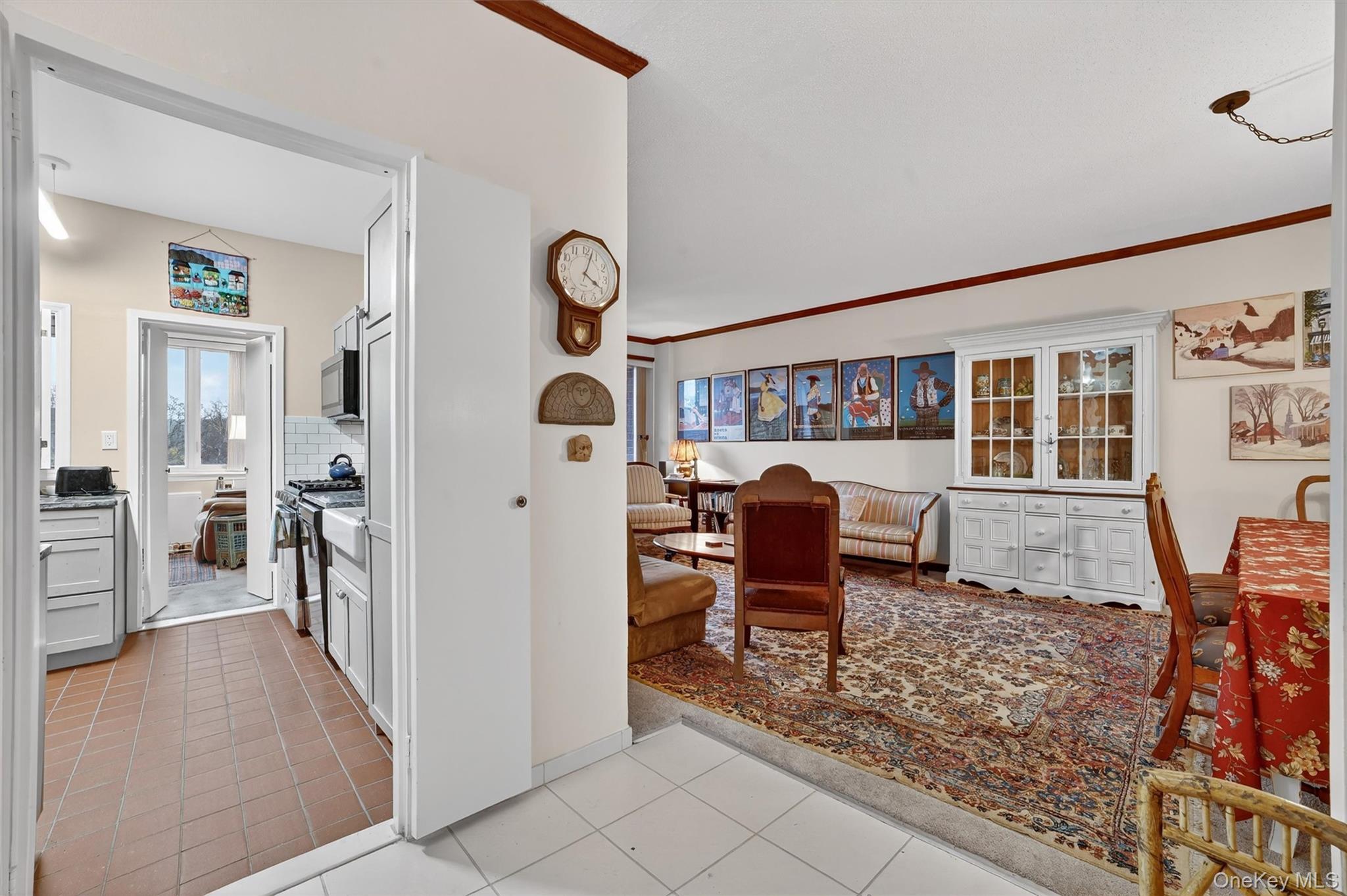 16 Rockledge Avenue, Unit 5L2 Ossining, NY 10562 - Photo 5 of 33 a living room with furniture and a large window