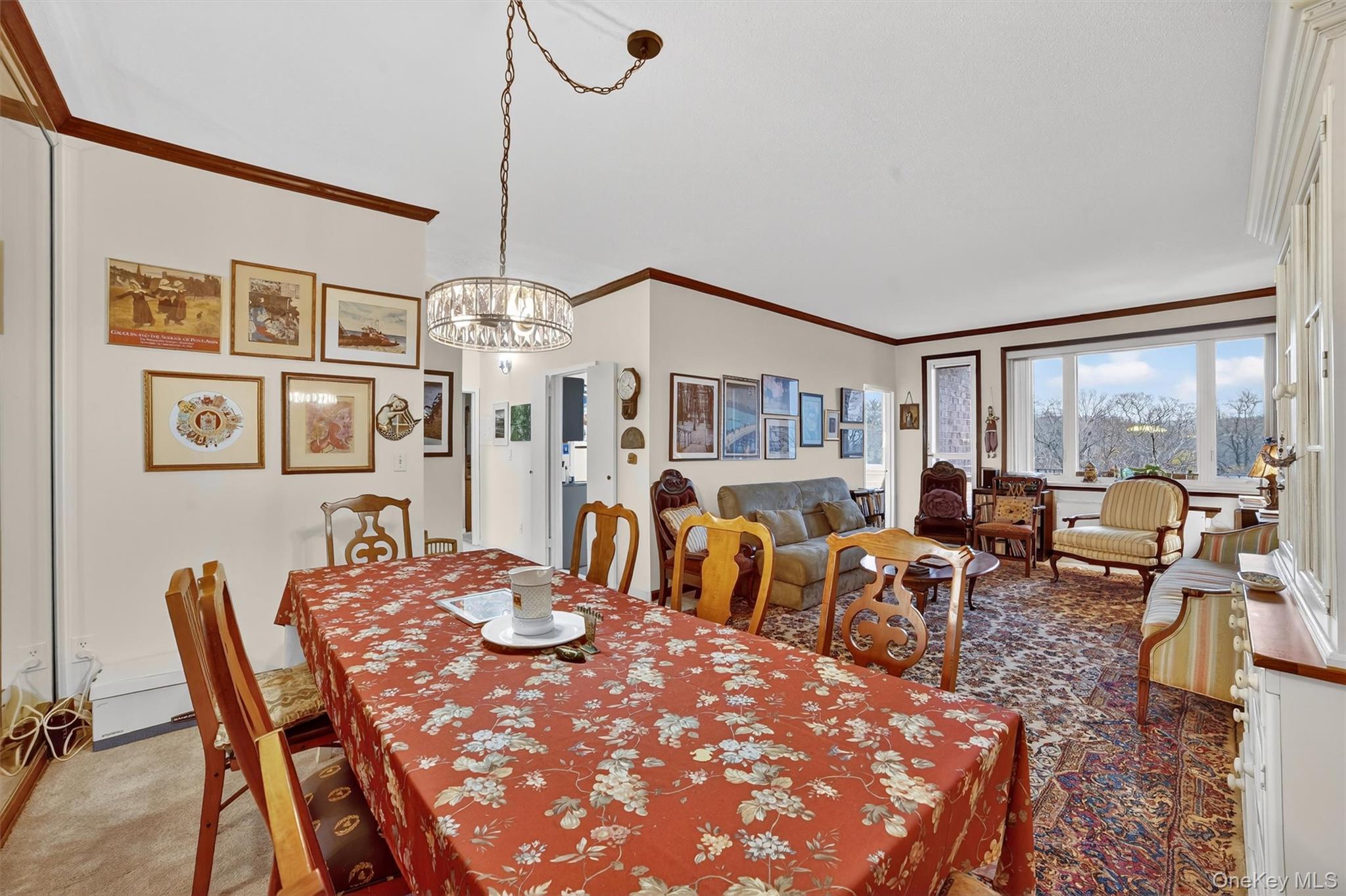 16 Rockledge Avenue, Unit 5L2 Ossining, NY 10562 - Photo 6 of 33 a view of a dining room with furniture large window and wooden floor