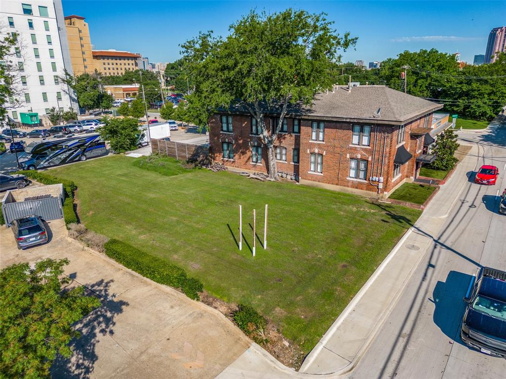 911 North Haskell Avenue Dallas, TX 75246 - Photo 2 of 6 a view of a house with a yard