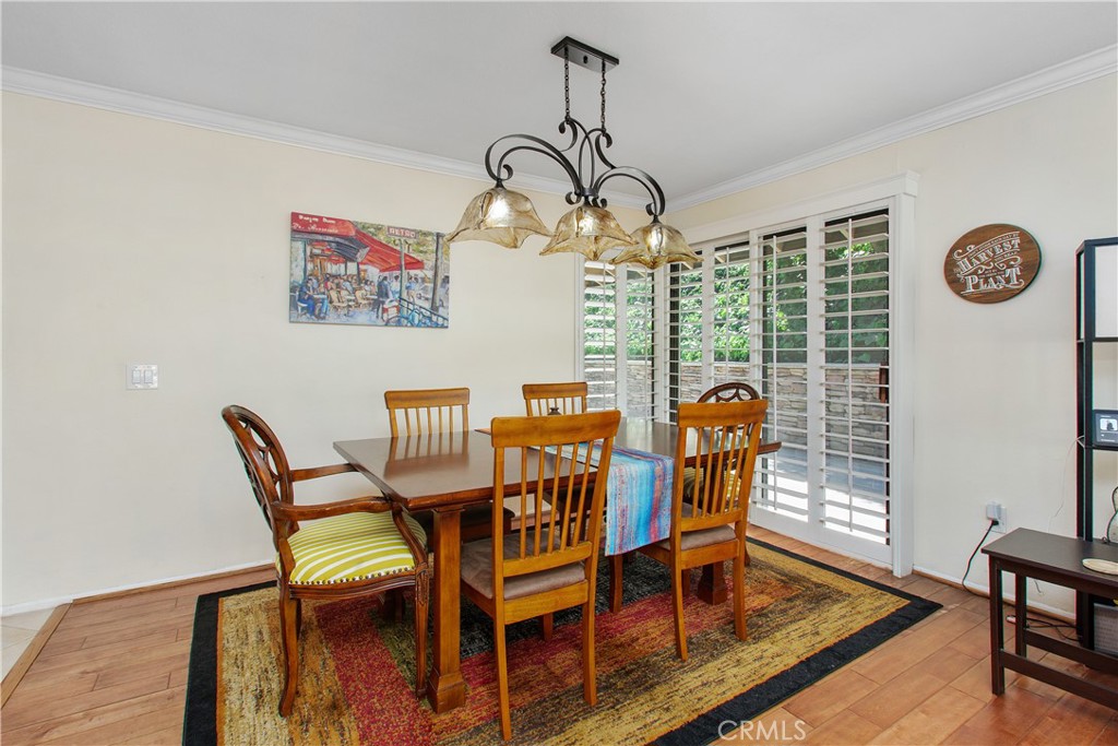 1451 Trenton Drive Riverside, CA 92506 - Photo 15 of 41 The dining room also has a sliding door leading to the side patio. This provides seamless connections to the outdoor and indoor living spaces.