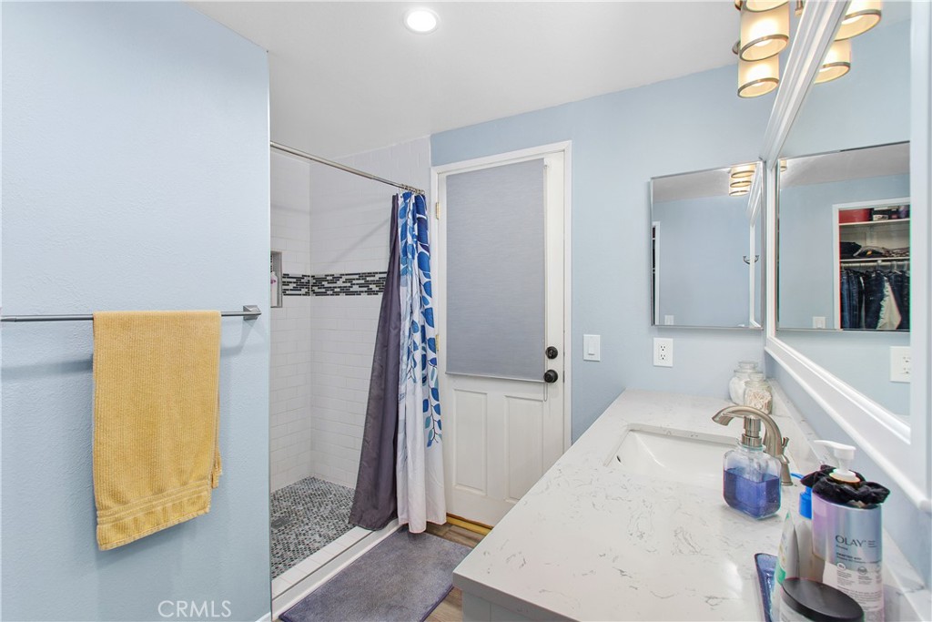 1451 Trenton Drive Riverside, CA 92506 - Photo 33 of 41 The shower has been updated with custom tile from floor to ceiling.