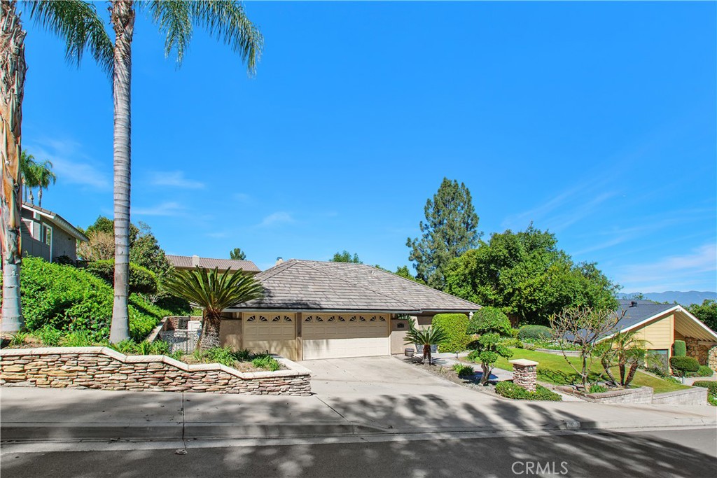 1451 Trenton Drive Riverside, CA 92506 - Photo 41 of 41 The front driveway offers extra wide parking access.