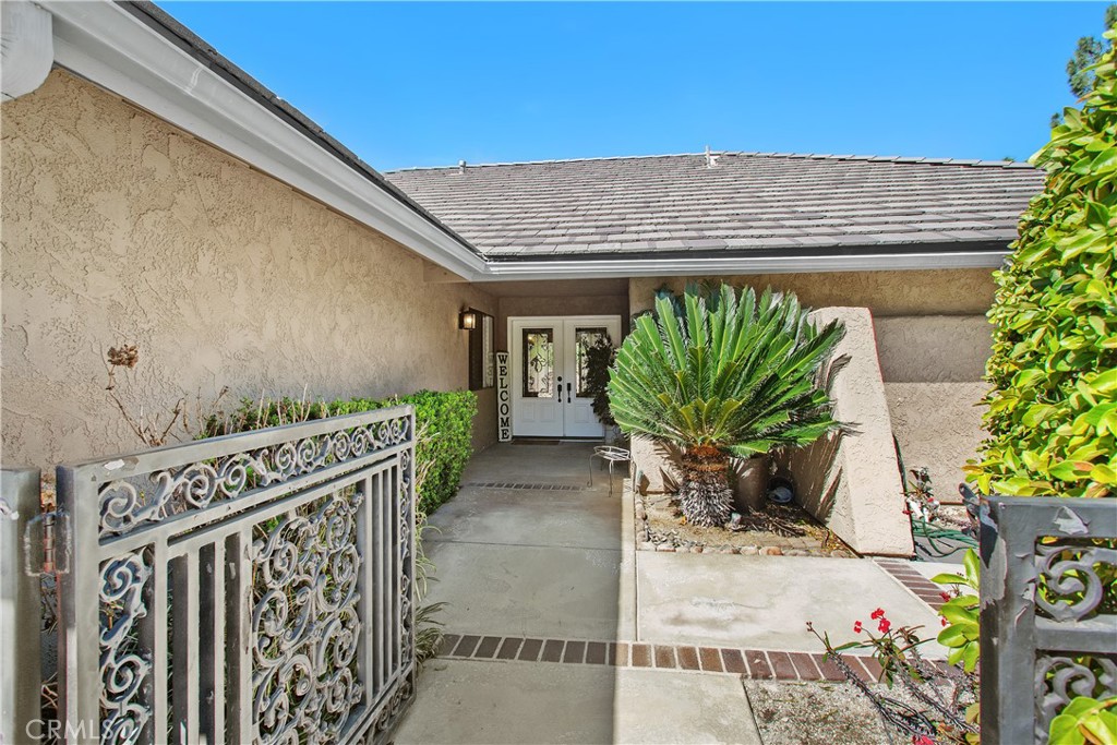 1451 Trenton Drive Riverside, CA 92506 - Photo 5 of 41 The front courtyard provides privacy and a welcoming environment for your guests as the come to your home.
