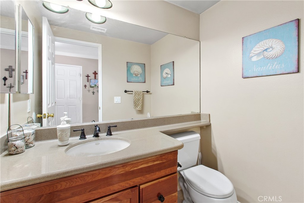 1451 Trenton Drive Riverside, CA 92506 - Photo 7 of 41 The hall half bath.