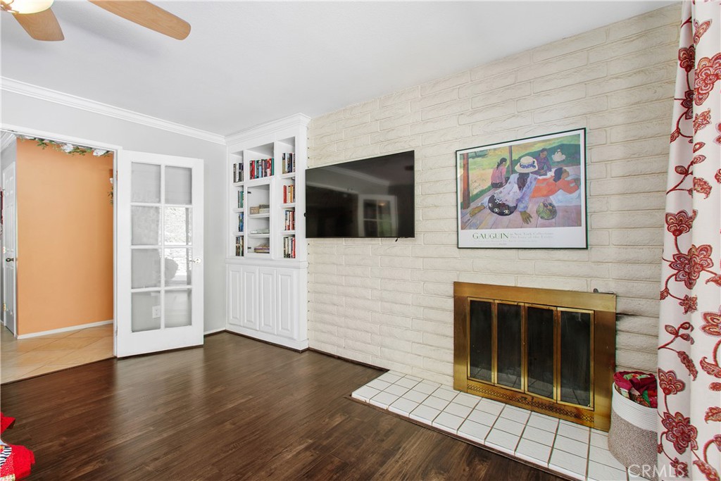 1451 Trenton Drive Riverside, CA 92506 - Photo 10 of 41 There is also a built-in bookcase cabinet on the fireplace wall.