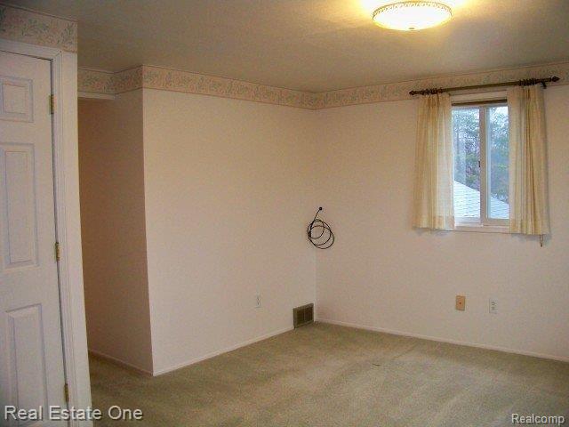 4620 North Tipsico Lake Road Highland, MI 48357 - Photo 14 of 25 Master Bedroom